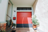 Modernisiertes EFH mit Ferienwohnung, Garten und Terrasse in Kinheim an der Mosel - Garagentor