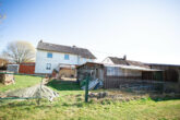 Großzügiges 1-2-Familienhaus mit Garage und Carport in Ortsrandlage von Minderlittgen, bei Wittlich - Rückansicht Grundstück