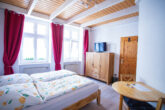 Attraktives Mehrfamilienhaus mit 6 Apartments und Ausbaureserve - Stuido EG