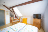 Attraktives Mehrfamilienhaus mit 6 Apartments und Ausbaureserve - Studio DG