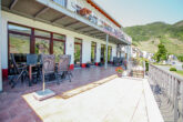 Ferienwohnungen mit Moselblick für Menschen mit Mehrfachbehinderung, großes Wohnhaus in bester Lage von Bremm - Terrasse Ferienwohnungen