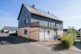 Teilrenoviertes 1-2 Familienhaus mit gutem Vermietungspotenzial - Rückansicht