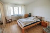 Modernisiertes Mehrfamilienhaus mit Garten, Dachterrasse und fantastischem Ausblick in Zell, Mosel - Schlafzimmer EG