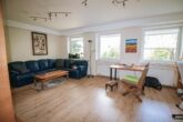Modernisiertes Mehrfamilienhaus mit Garten, Dachterrasse und fantastischem Ausblick in Zell, Mosel - Wohnzimmer 2. UG